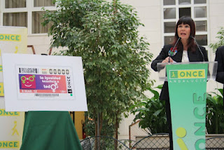 La consejera para la Igualdad y Bienestar Social de la Junta de Andalucía, Micaela Navarro durante su intervención en la presentación del cupón dedicado al Día Internacional de la Mujer
