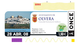 Cupón del 28 de abril dedicado a Olvera (Cádiz), con una imagen panorámica de la localidad