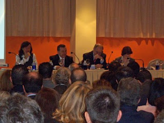 José María Arroyo y Enrique Servando en la mesa de las Jornadas