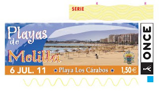 Cupón del día 6 de julio dedicado a la playa Los Cárabos en Melilla