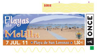 Cupón del día 7 de julio dedicado a la playa de San Lorenzo en Melilla