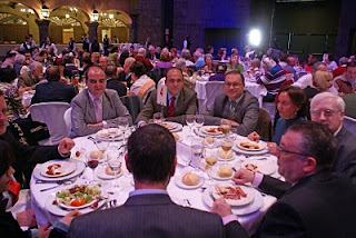 Los máximos responsables de la Unión de Consumidores en una de las mesas