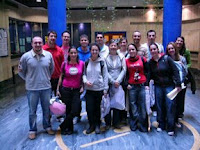 Un grupo de malagueños en el hall de entrada de la sede de la ONCE