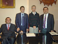 Los firmantes del acuerdo tras la firma del convenio