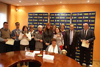 Foto de familia de la presidenta del Consejo y el subdelegado territorial con los premiados